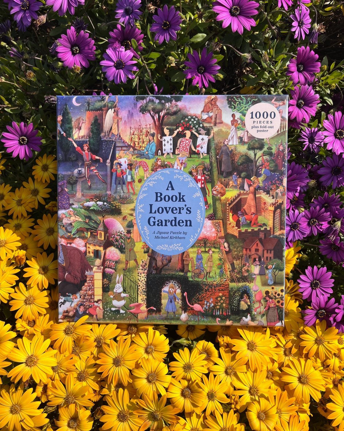 Book Lover's Garden puzzle box resting on a bed of yellow and purple flowers