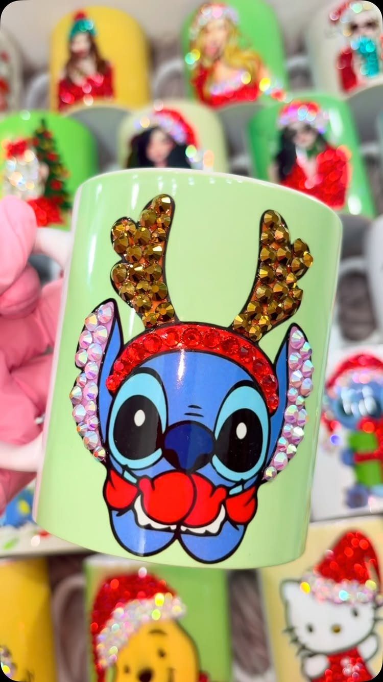 Light green mug featuring Stitch as a reindeer with glittery antlers and red headband