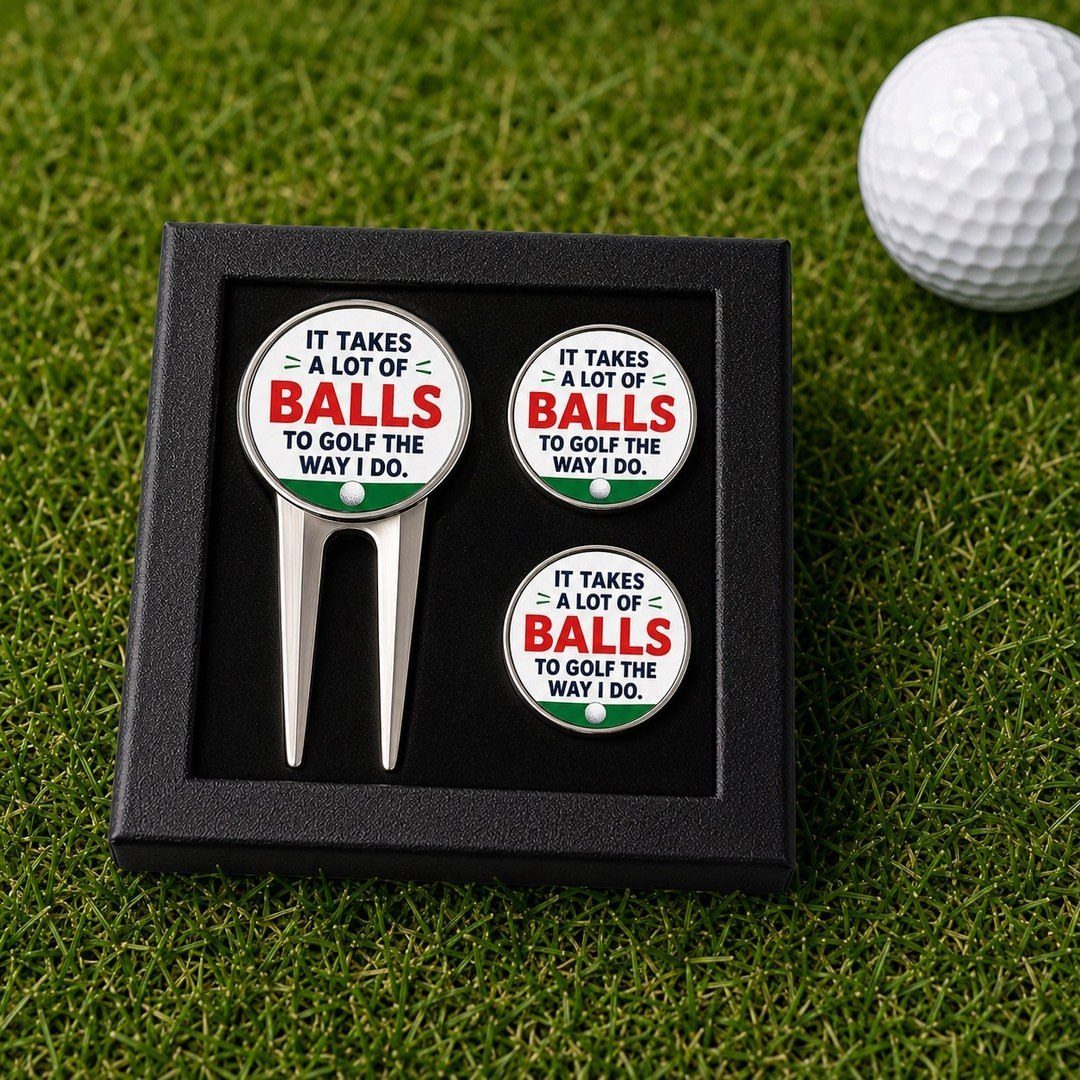 Golf divot tool and ball markers with funny text in a black box.