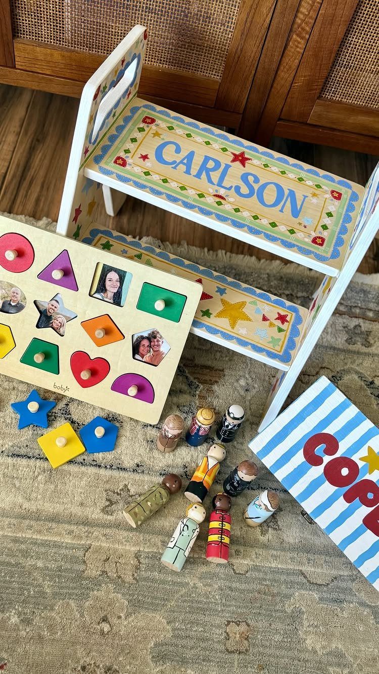 Personalized children's toys including a named step stool and a photo shape sorter.