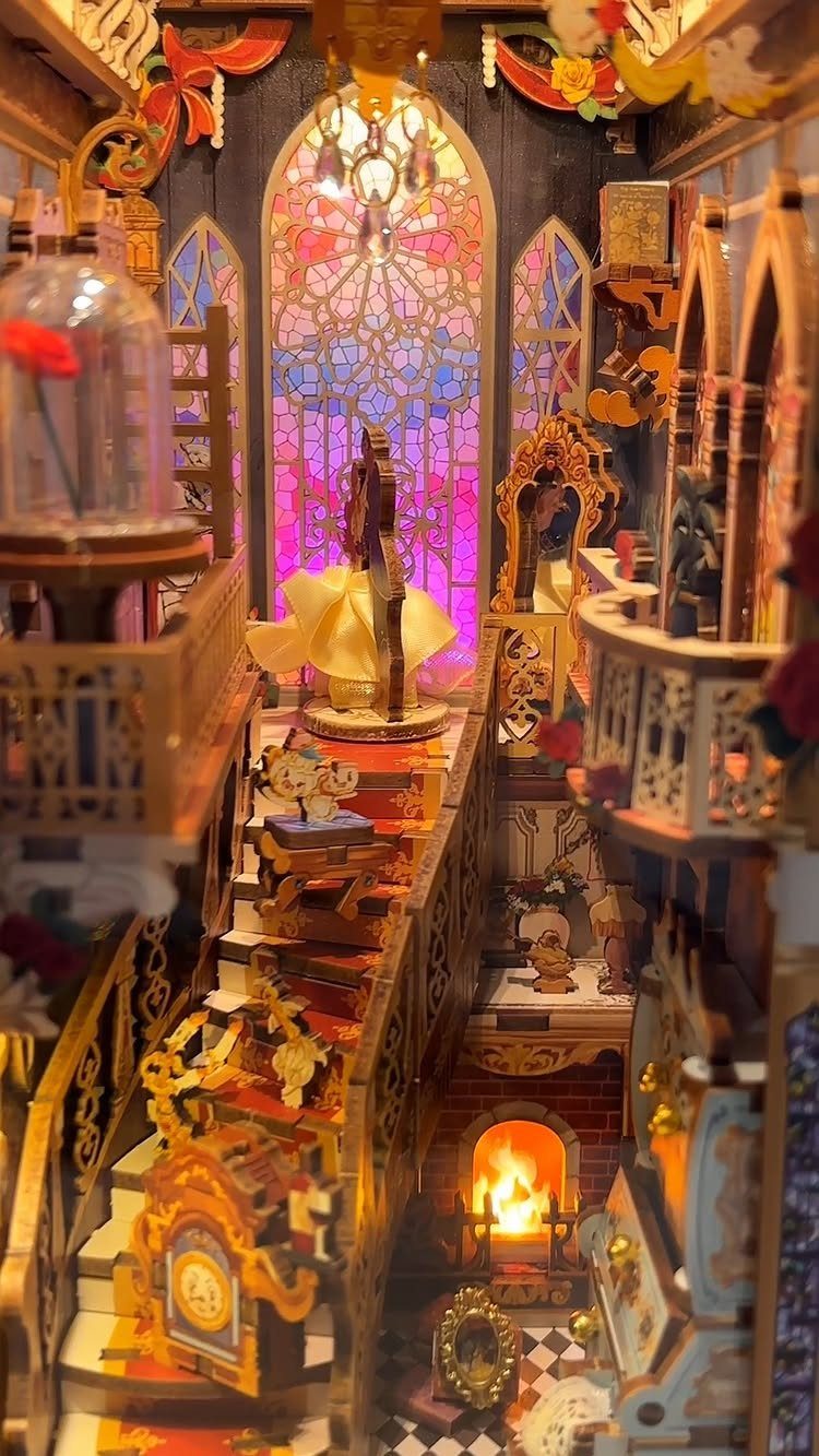 Miniature fantasy dollhouse room with stained glass, golden stairs, and a glowing fireplace.