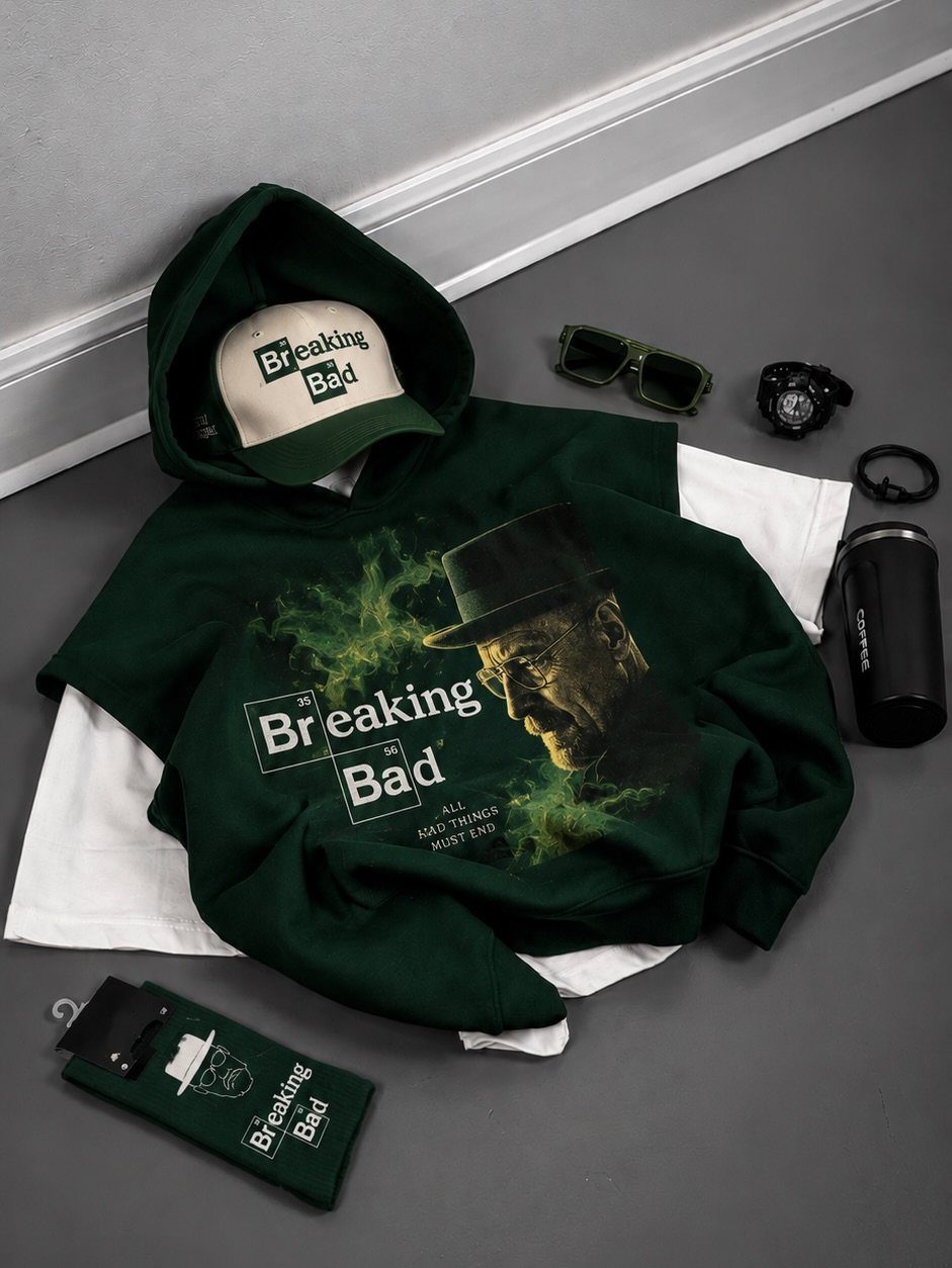 Dark green Breaking Bad hoodie with Walter White graphic and matching accessories.