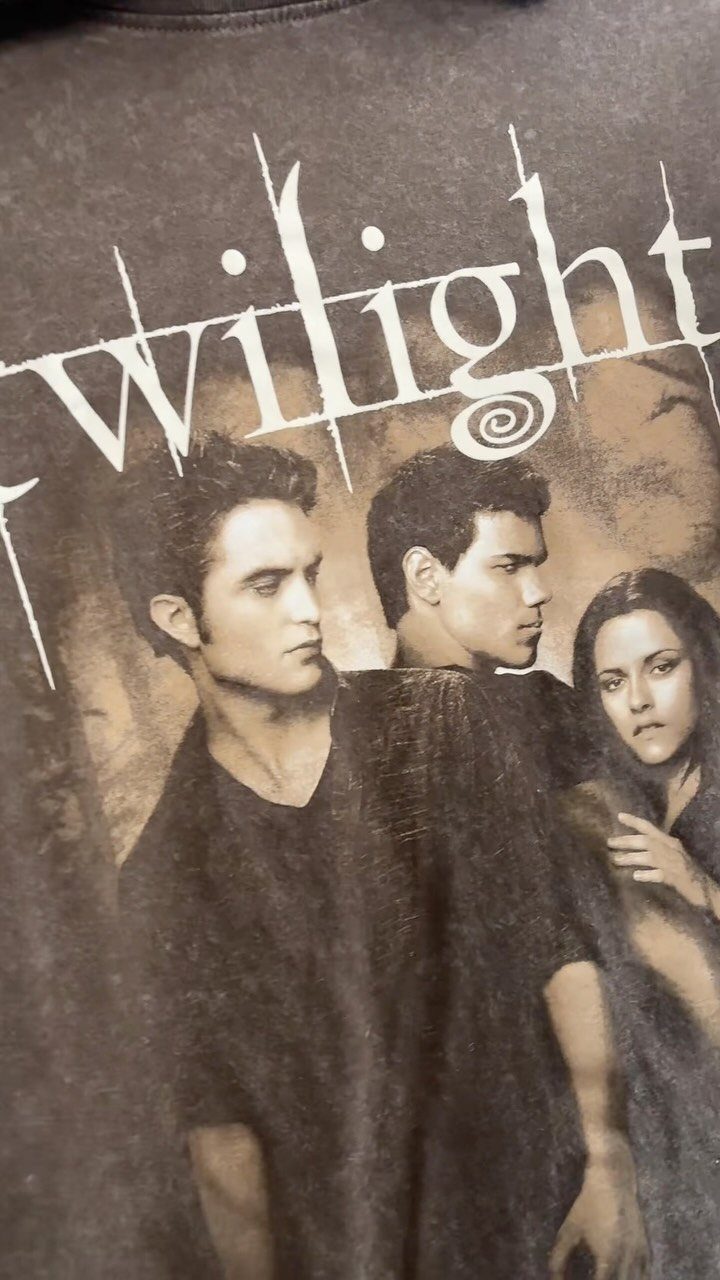 Dark grey t-shirt with a graphic print of Twilight movie characters and title.
