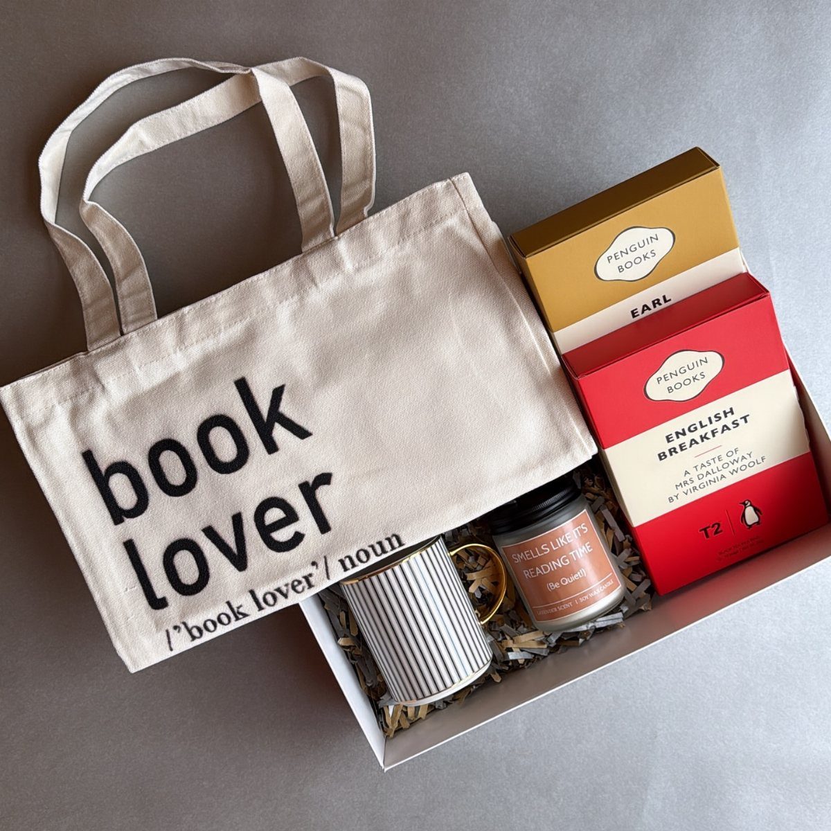 Book lover gift set with tote bag, tea, mug, and candle in box