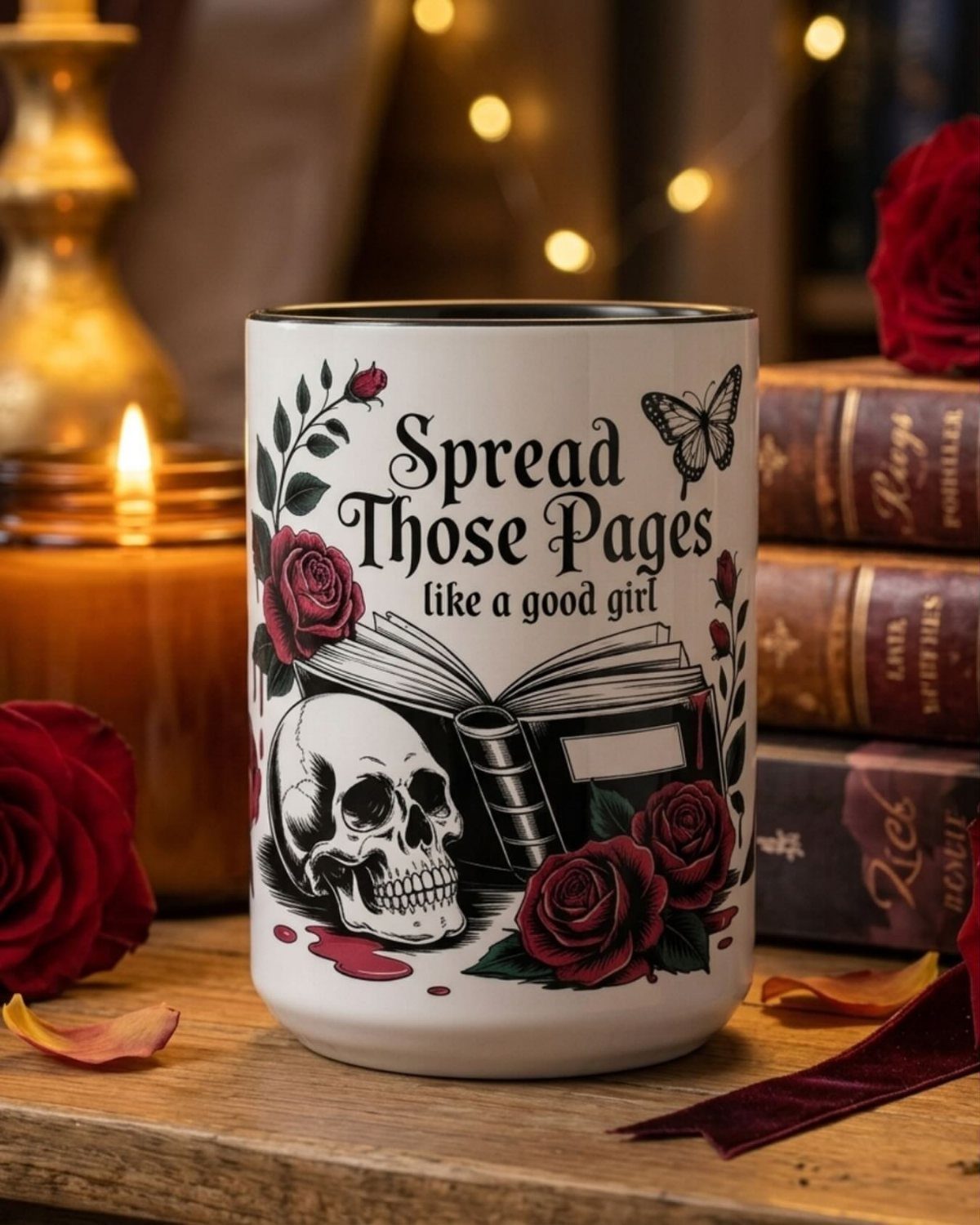 White ceramic mug with bookish quote, skull, and roses on wooden table