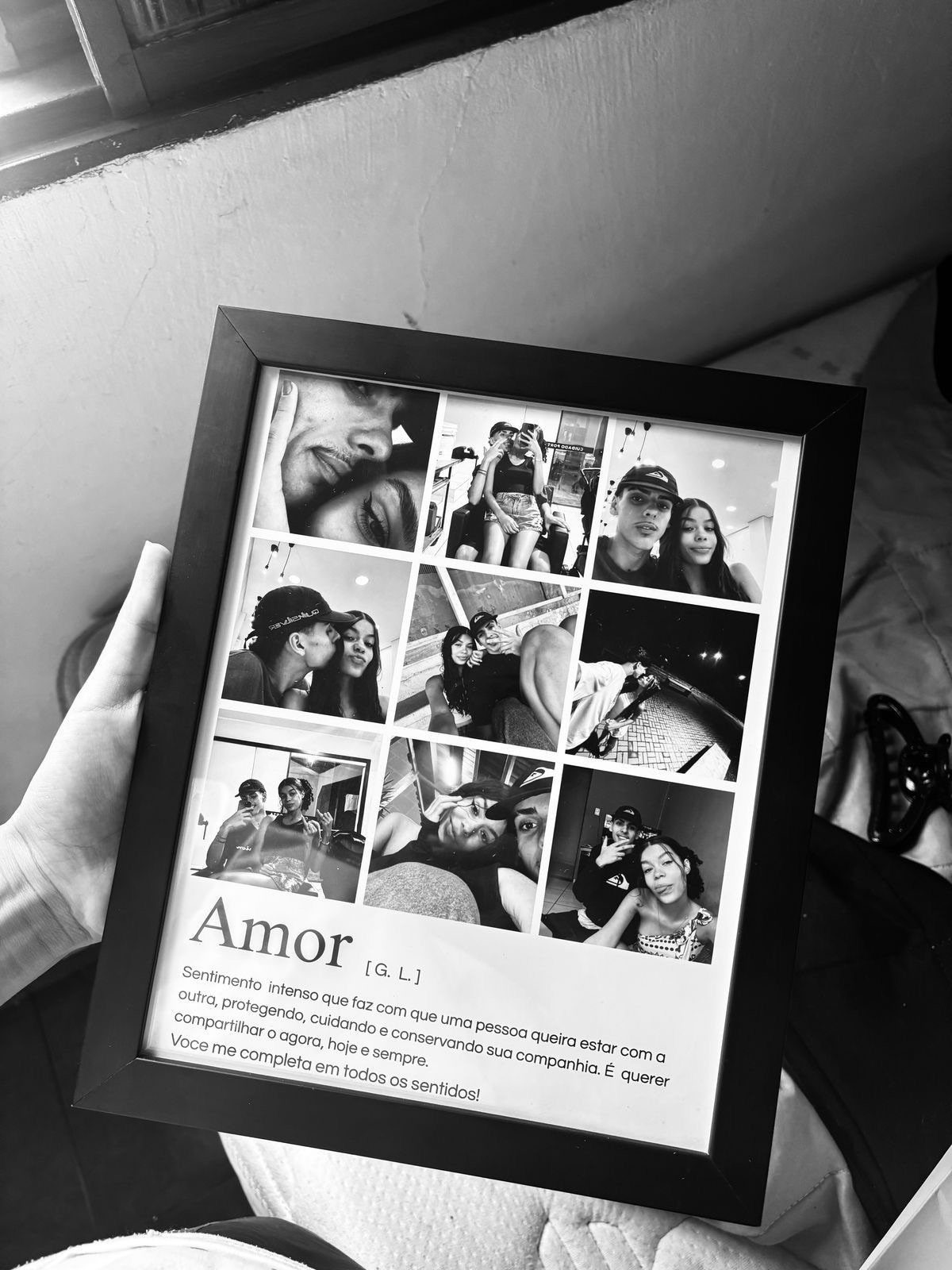 Framed black and white photo collage of a couple with romantic text below.