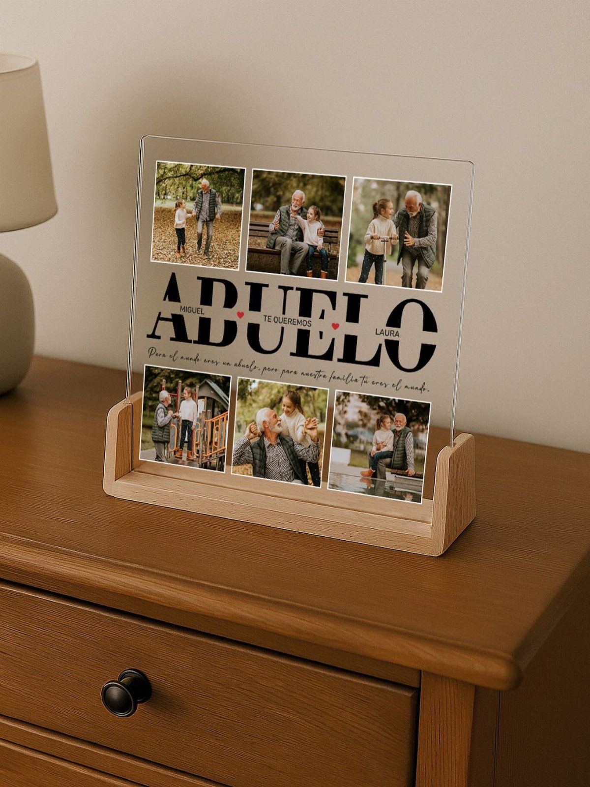 Personalized acrylic photo frame with family pictures and the word Abuelo on a dresser