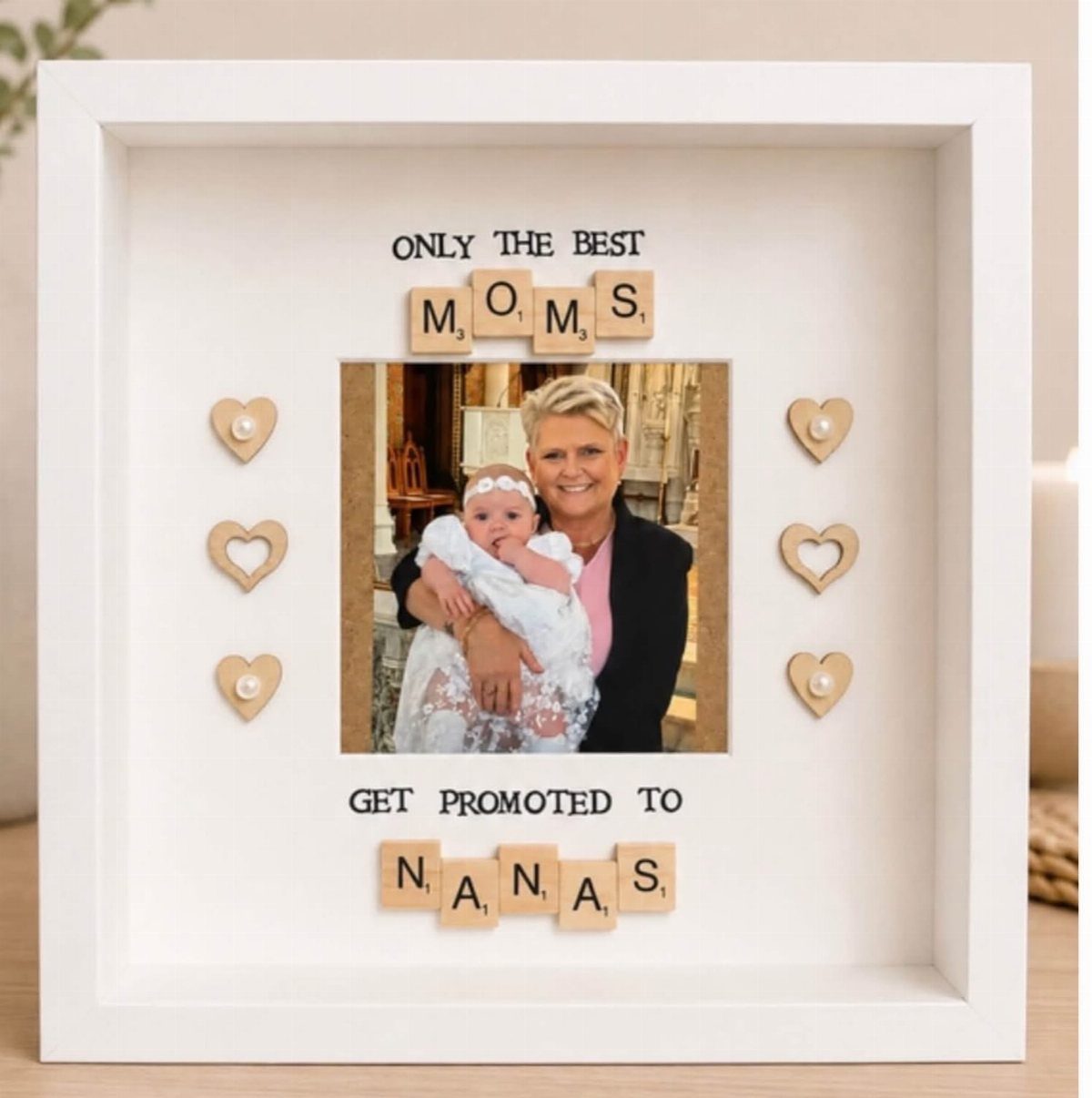 Personalized shadow box gift for a grandmother featuring a photo and wooden tiles.