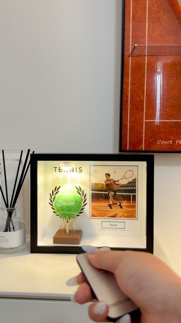 Custom tennis sports plaque in a black frame with a glowing tennis ball.