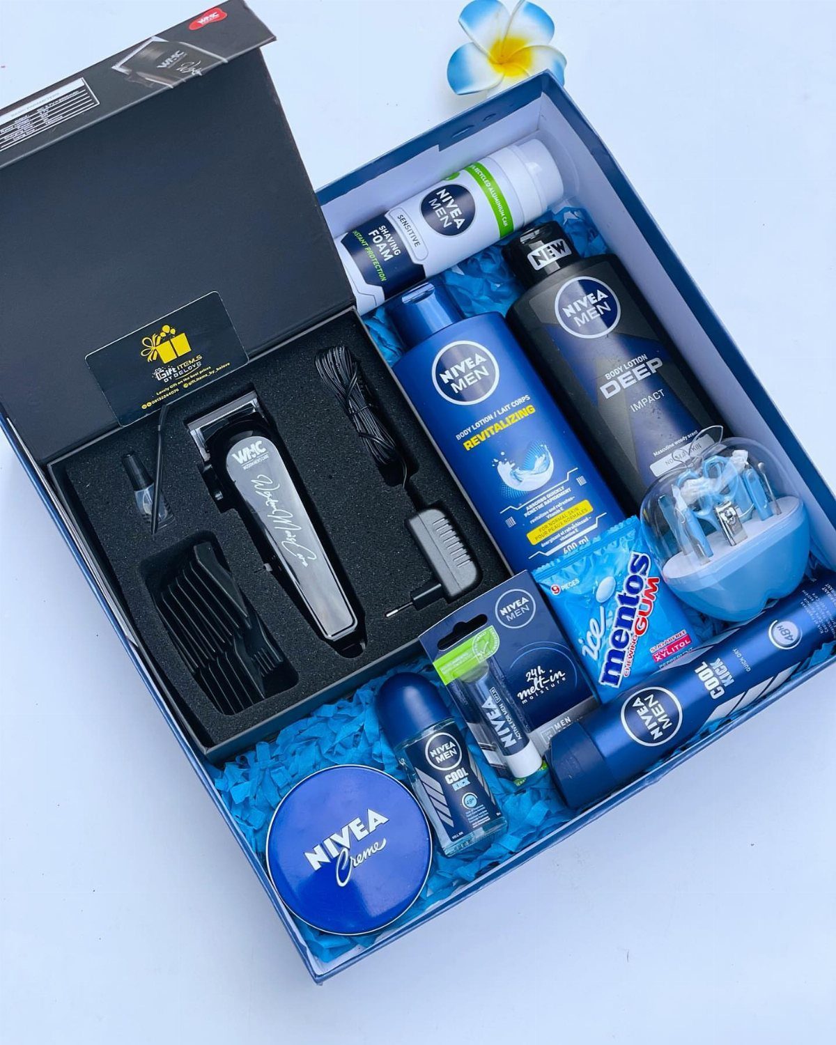 Nivea Men grooming kit in a blue box with hair clipper and toiletries.