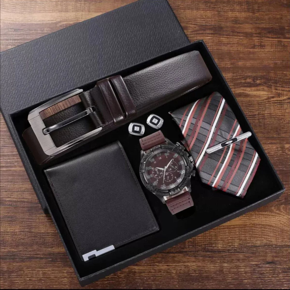 Men's gift set with leather belt, wallet, watch, and tie in black box