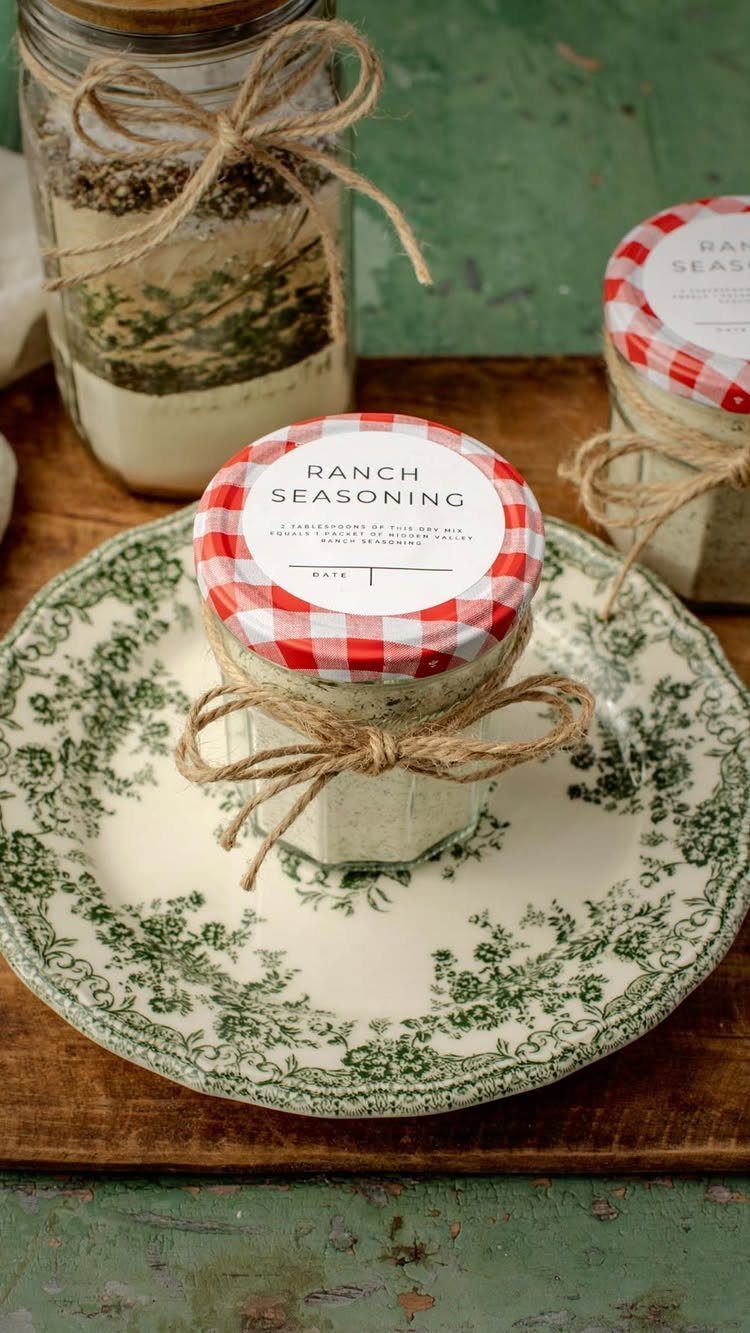 Ranch seasoning in a mason jar with a checkered lid and twine bow.