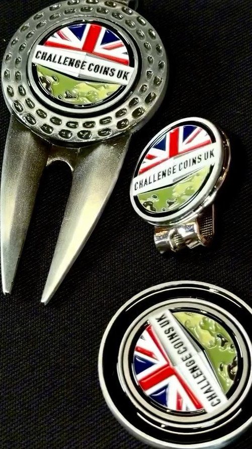 Silver golf divot tool and ball markers featuring the Union Jack flag design.