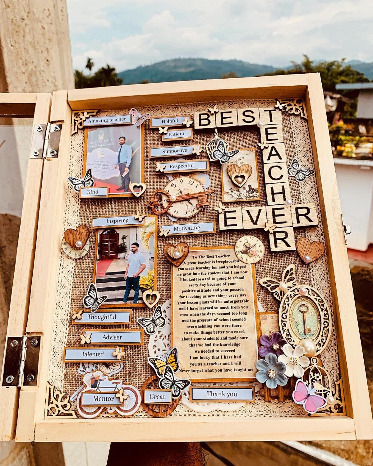 Wooden shadow box with photos and tiles spelling BEST TEACHER EVER for a man.