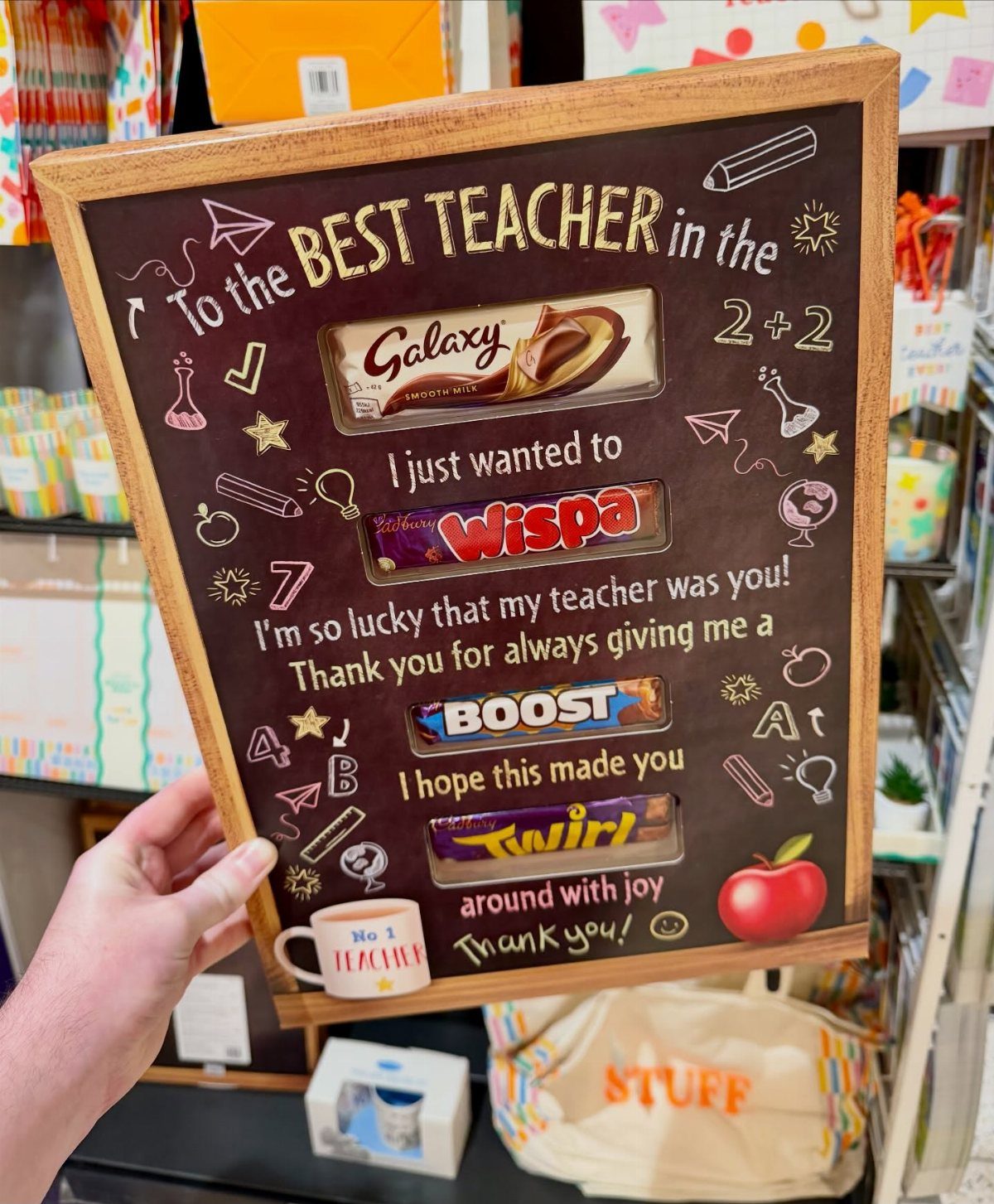Wooden framed chalkboard gift with embedded chocolate bars and teacher appreciation message.