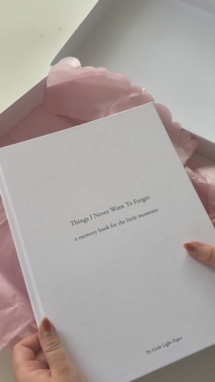 White memory book titled Things I Never Want To Forget in a gift box