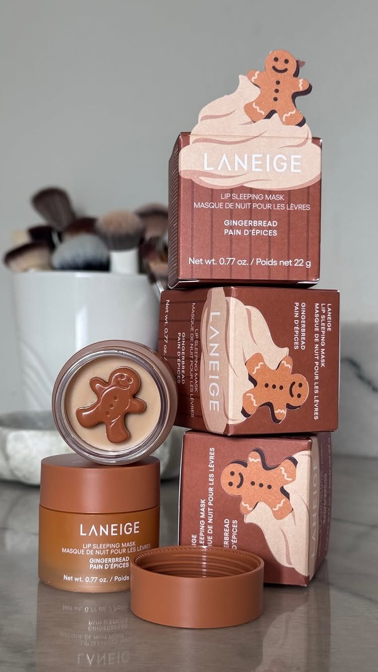 Laneige Lip Sleeping Mask jars and boxes with gingerbread man holiday designs.