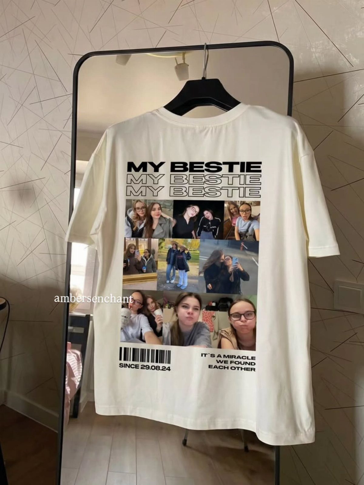 Cream t-shirt with a photo collage and 'MY BESTIE' text hanging on mirror