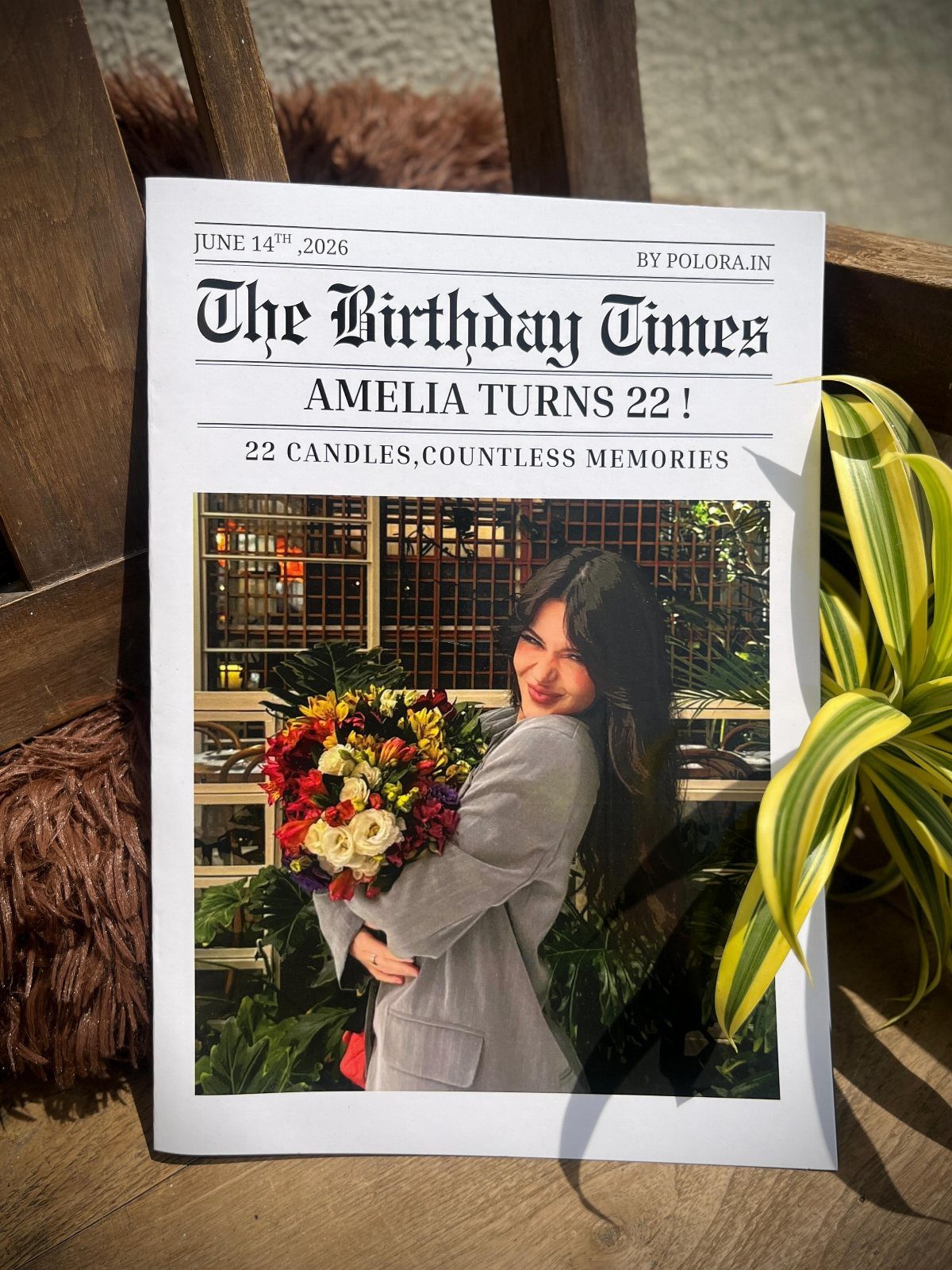 Personalized birthday magazine cover featuring a woman with a colorful flower bouquet.