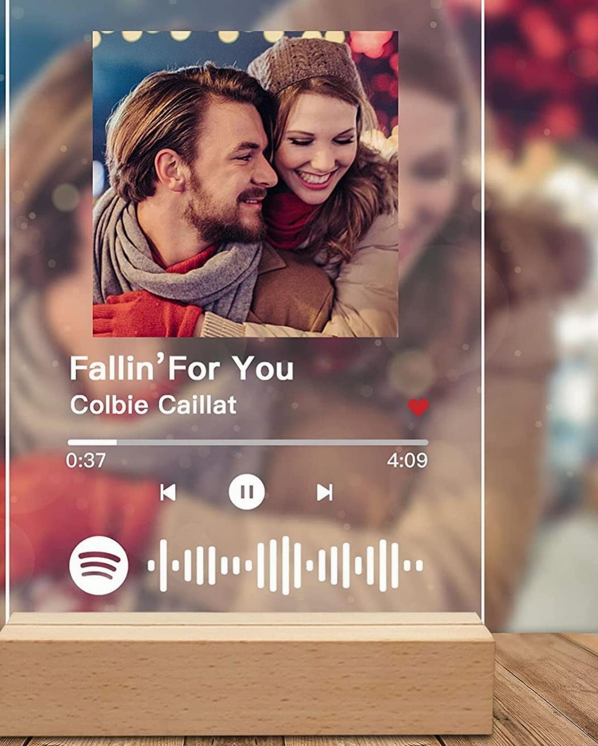 Acrylic music plaque with a couple's photo and a Spotify song waveform code.